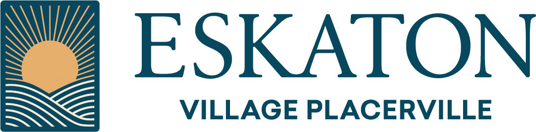 Logo for Eskaton Village Placerville featuring a stylized sun rising over wavy lines inside a square on the left, with the name ESKATON and VILLAGE PLACERVILLE in bold capital letters to the right.