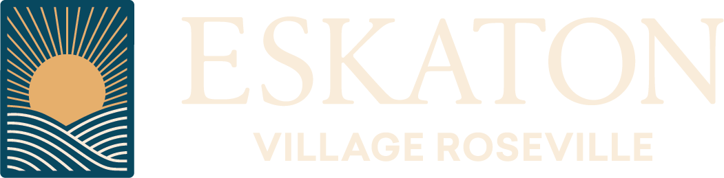 Logo with a stylized sun rising over wavy lines on the left, and the text ESKATON VILLAGE ROSEVILLE in large, light-colored font on the right.