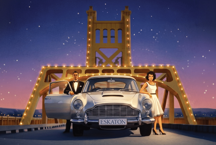 A man in a tuxedo and a woman in a white dress pose by a vintage silver car labeled ESKATON on a lit-up bridge at dusk, with stars in the sky behind them, capturing the timeless elegance of the Longevity Gala.
